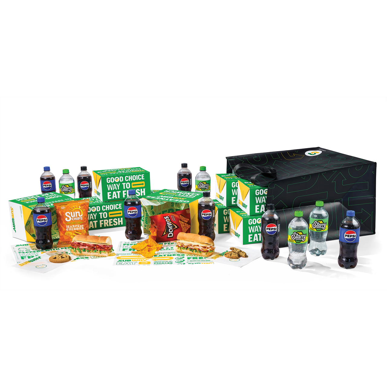 Subway® Catering subs, chips, cookies and Pepsi products on countertop.